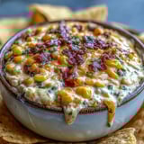 Crack Corn Dip is baked golden and bubbly, a perfect hot appetizer for game day.
