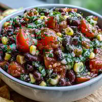 Vibrant 3-ingredient cowboy caviar dip with black beans, corn, and pico de gallo for a zesty appetizer.